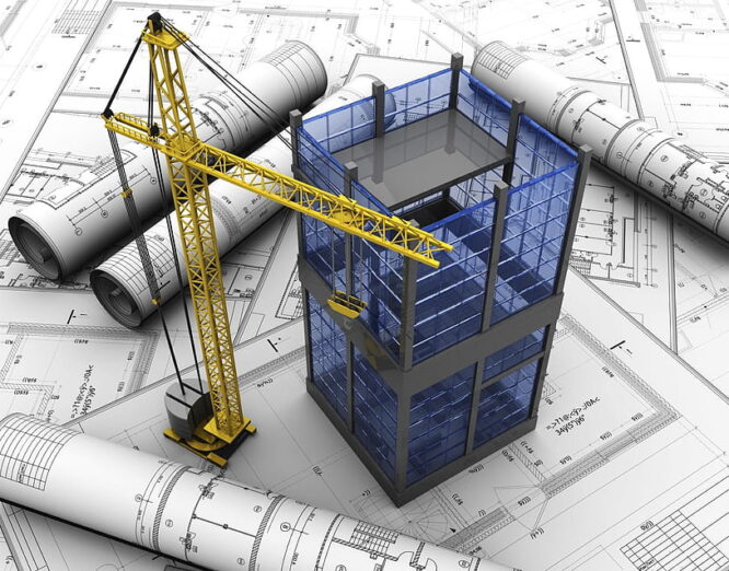 Structural model with a crane positioned nearby, showcasing construction progress